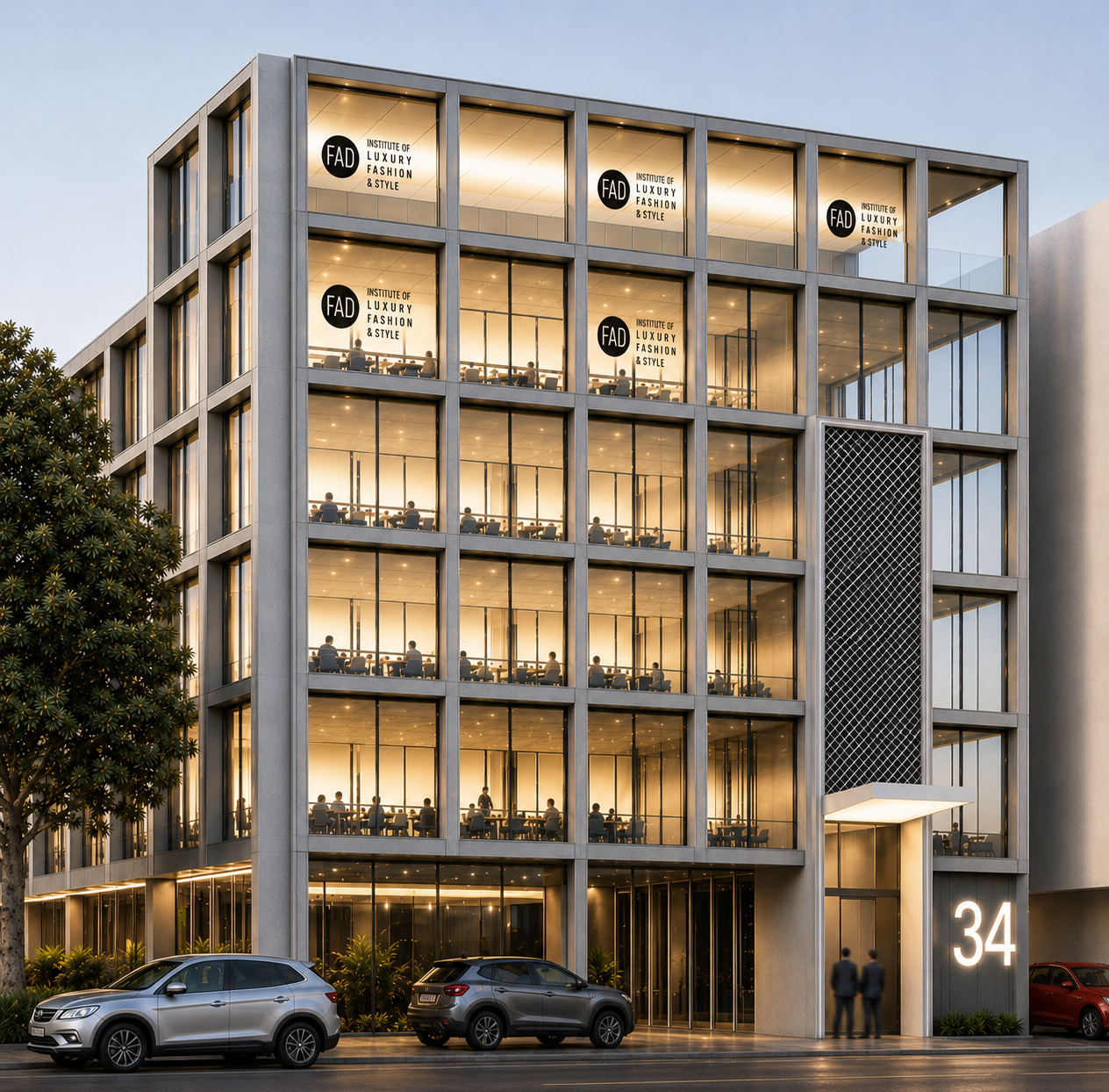 FAD Delhi campus — the facade at dusk, floors of studios glowing behind glass